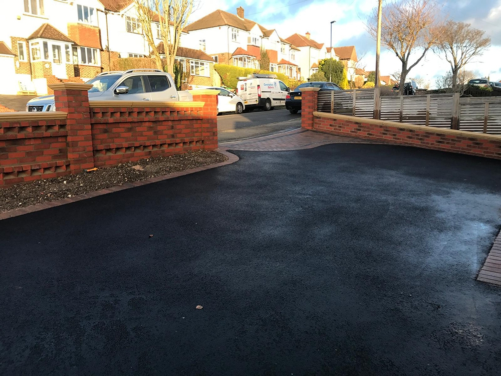 New tarmac driveway with block paving apron completed in Caterham